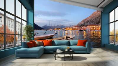 Picturesque Kotor bay at blue hour. Wonderful boats on te seascape backgrond of coast of Adriatic sea. Wall mural