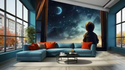 A child sitting on a window sill looking at the sky Wall mural