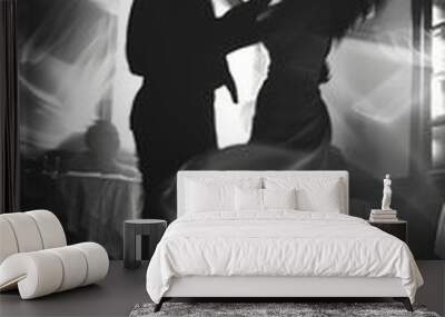 A man and a woman dancing in a room Wall mural