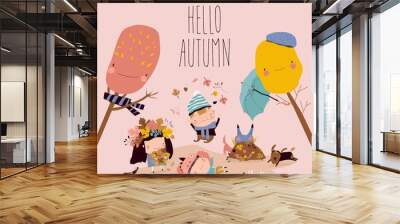 Happy kids playing with autumn leaves. Hello autumn Wall mural