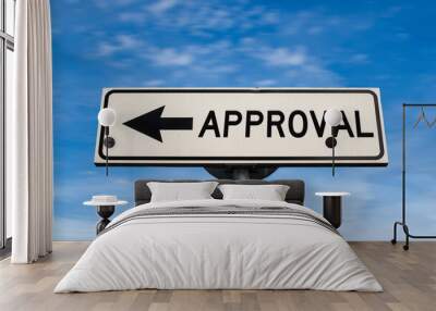 Approval road sign, arrow on blue sky background. One way blank road sign with copy space. Arrow on a pole pointing in one direction. Wall mural