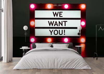 Lightbox with red lights in dark room with words - we want you! Wall mural