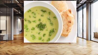 potato soup puree with broccoli served with pita Wall mural