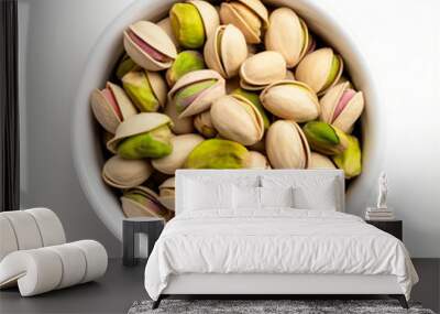 Pistachios in bowl Wall mural