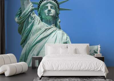 Close view of the Statue of Liberty over blue sky Wall mural