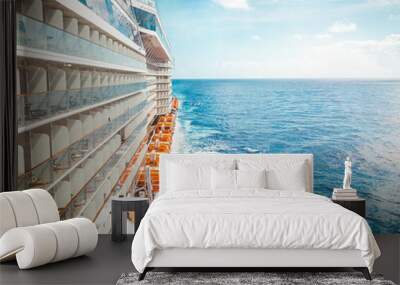 Side view of cruise ship on the blue sky background with copy space, blue tone Wall mural