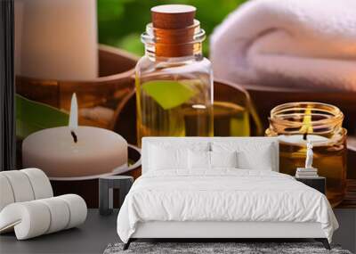 Relaxing and attractive spa atmosphere, candles, massage oil, clean towels and houseplants Wall mural