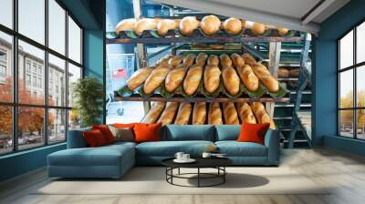 White bread Baguette freshly baked in a bakery Wall mural