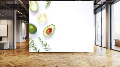 Avocado on the white background frame. Copy space. Top view Wall mural