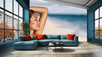 Banner woman relaxing touching her hair wellness summer holiday ocean beach panoramic background on tropical Caribbean summer vacation panorama. Asian girl breathing clean air. Wall mural