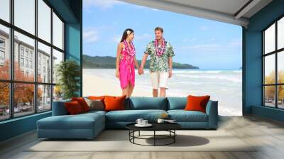 Beach couple on Hawaii vacation with Hawaiian leis Wall mural