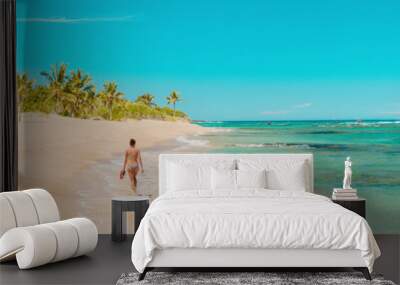 Beach panoramic travel banner of woman tourist walking alone on secluded shore in tropical Caribbean vacation destination. Wall mural