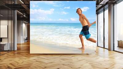 Beach vacation couple happy running of fun on landscape background banner. Young people tourists on tropical Caribbean holiday summer travel. Wall mural