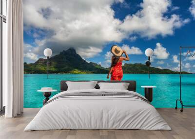 Bora Bora island luxury resort hotel woman relaxing at view of Mt Otemanu in Tahiti, French Polynesia Honeymoon travel destination for summer vacation. Wall mural