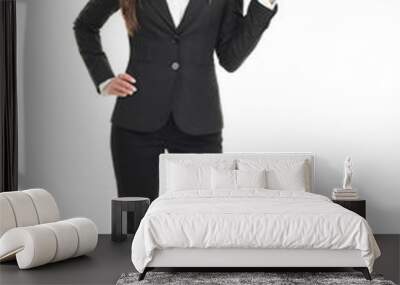 Businesswoman pointing on white background Wall mural