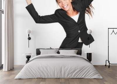 celebrating businesswoman jumping Wall mural