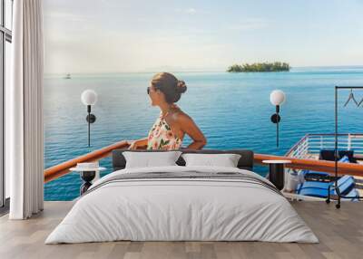 Cruise ship travel vacation woman looking at ocean from deck of sailing boat. Luxury Tahiti Bora Bora French Polynesia destination summer lifestyle. Wall mural