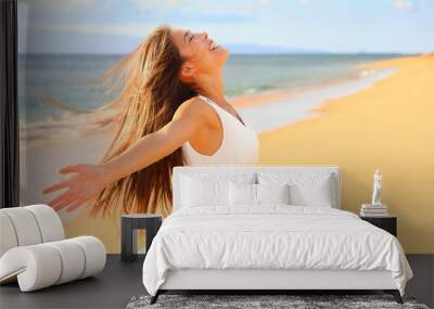 Free happy woman on beach Wall mural