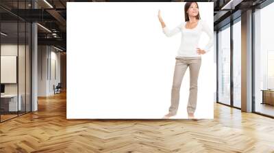 Full length of young woman with hand on hip making stop gesture talk to the hand isolated over white background.
Isolated cut out in transparent PNG file Wall mural