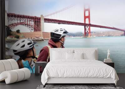 golden gate bridge biking tourists on guided tour Wall mural