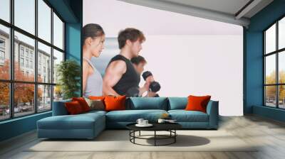 Gym training fitness people lifting weights in weightlifting group class in studio. Wall mural