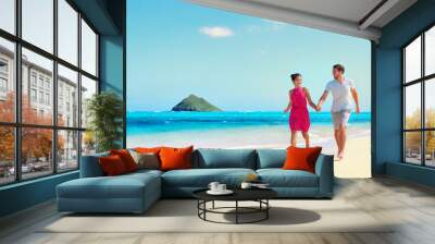 Hawaii vacation couple walking relaxing on white sand and pristine turquoise ocean water on Hawaiian beach Lanikai, Oahu island, USA. Holiday background with blue sky copy space for travel concept. Wall mural