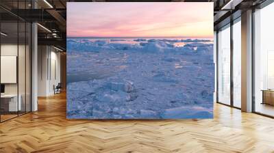 Iceberg from glacier in arctic nature landscape on Greenland. Aerial photo drone footage of icebergs in Ilulissat icefjord. Affected by climate change and global warming. Wall mural