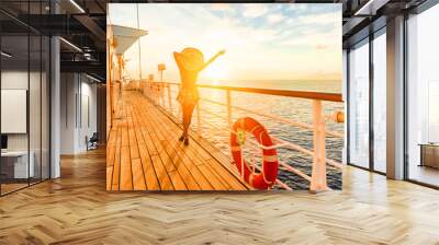 Luxury cruise ship travel elegant woman having fun carefree on deck enjoying watching sunset on Europe cruising destination vacation. Summer european mediterranean cruiseship sailing away on holiday. Wall mural