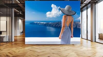 luxury travel vacation woman looking at view on santorini famous europe travel destination. elegant  Wall mural