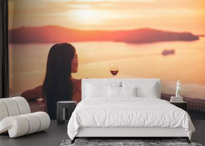 Santorini hot tub jacuzzi pool woman - wellness spa concept in luxury retreat - high end fancy lifestyle honeymoon destination. Wall mural