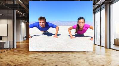 Sport - young fitness couple Wall mural