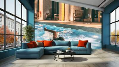 Swimming pool of condo buildings re-opening after COVID-19 confinement. Swimmer woman doing crawl in public pool banner panoramic. Wall mural