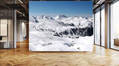 Panoramic view of the ski slopes of the famous La Plagne-Bellecote ski resort in the heart of the French Alps in the Tarentaise valley at the foot of Mont Blanc Wall mural