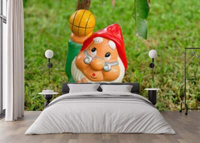 A garden gnome in a garden Wall mural