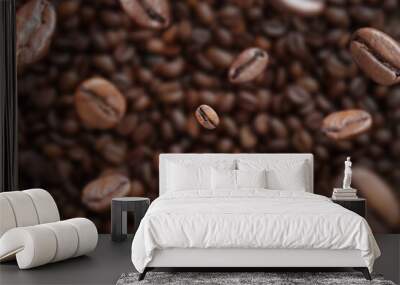 Coffee beans fall into a pile, selective focus. Pile of halves of dark brown coffee beans, copy space Wall mural