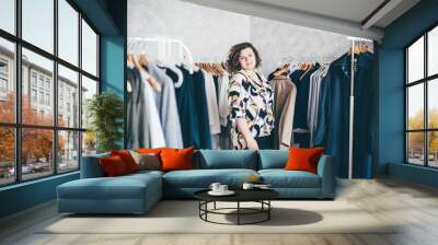  Plus Size Woman Choose Fashioned Dress in Store. Plus size women shopping. Wall mural