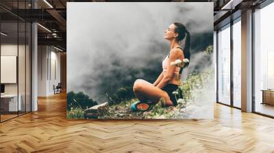 Woman meditating on mountain cliff above the clouds. Alone travel healthy lifestyle. Healthy life Concept. Wall mural