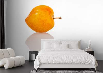 sweet juicy yellow plum on white mirroring surface close up Wall mural