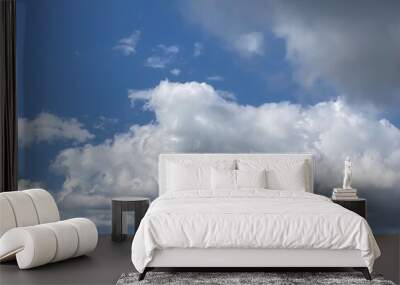 White clouds on the bright blue clean sky Wall mural