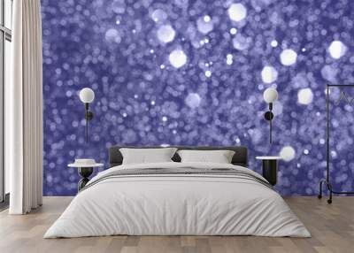 Trendy very peri color concept of the year 2022, violet blue sparkling glitter bokeh background, christmas abstract defocused texture. Holiday lights Wall mural