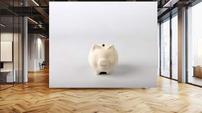 White piggy bank on grey background Wall mural