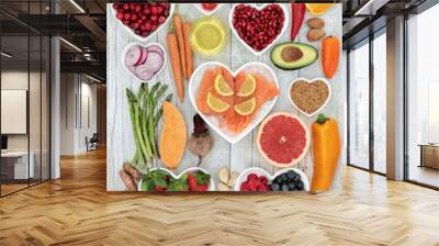 Health food for a healthy heart with vegetables, fruit, fish, nuts, seeds, supplement powders, pulses, cereals, spices and herbs used in herbal medicine. High in omega 3, anthocyanins  & antioxidants  Wall mural