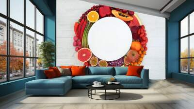 Immune boosting healthy food for low cholesterol high in lycopene, anthocyanins, antioxidants, vitamins, minerals & dietary fibre. With fruti & vegetables around a white plate on rustic wood. Wall mural