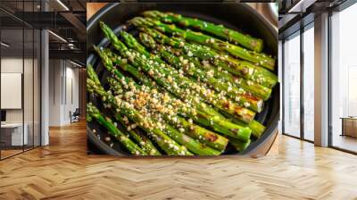 Baked green asparagus with sesame seeds in a pan Wall mural