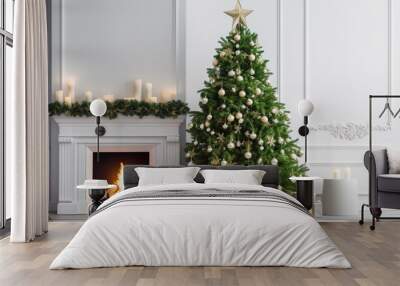 A big beautiful green Christmas tree with shiny balls and New Year's gifts in holiday boxes on the background of a light wall with a fireplace Wall mural