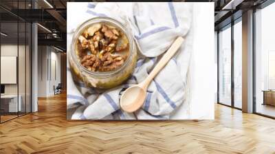 Altai candied honey with walnuts in a glass jar Wall mural