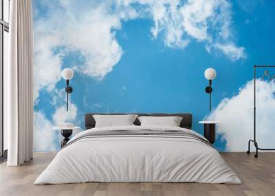 Cumulus humilis clouds in the blue sky, view from below Wall mural