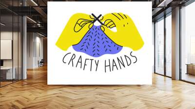 Hands Holding Knitting Needles Sticker. Hand drawn handmade clipart symbol. Gesture with knitwear. Isolated vector illustration. Handicraft badge. Wall mural