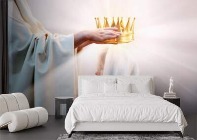 Hands placing a crown on a woman's head Wall mural