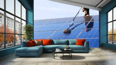 Cleaning solar panels with brush and water Wall mural